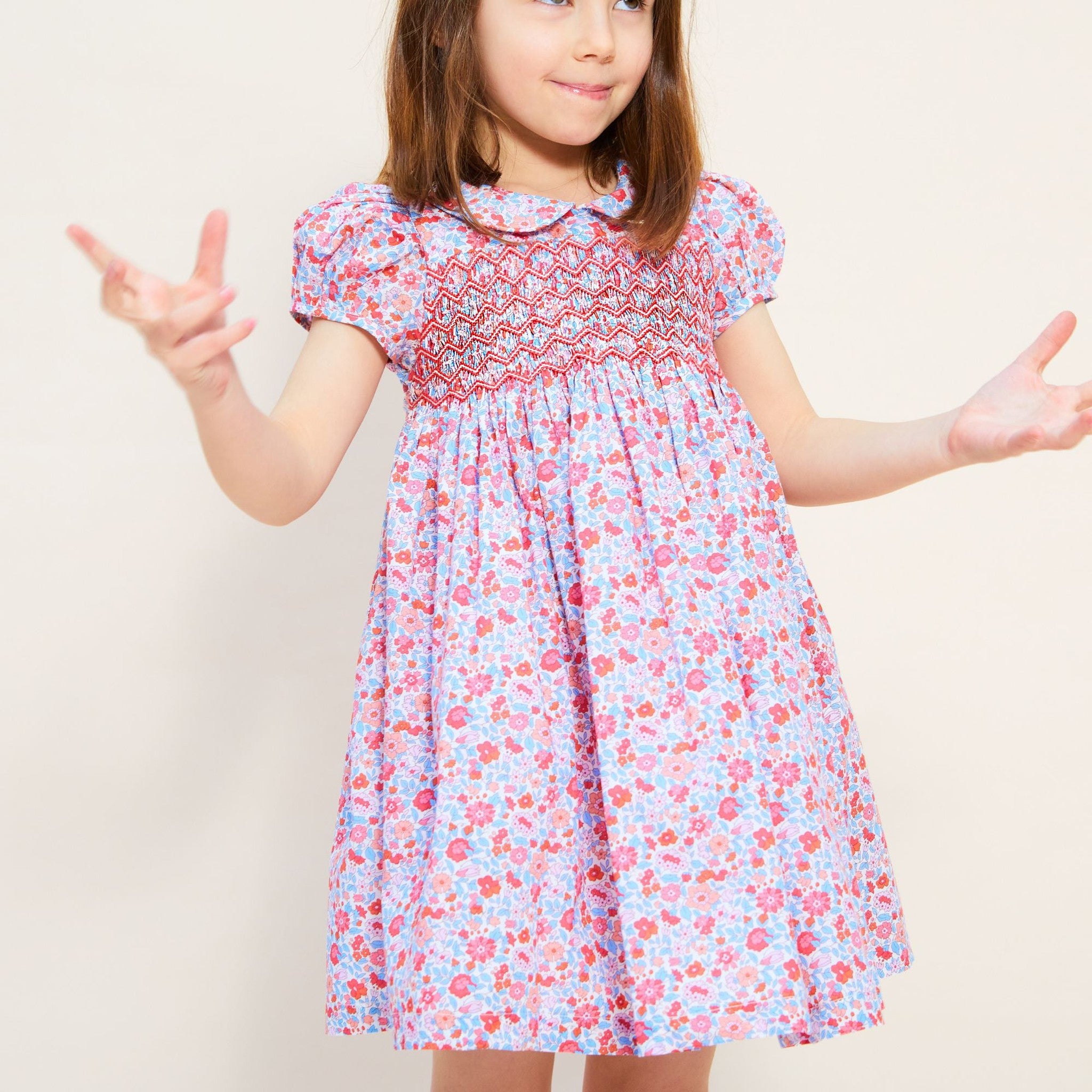 ANTOINETTE DRESS WITH CARNATION HAND SMOCKING MADE WITH LIBERTY THERESA PINK