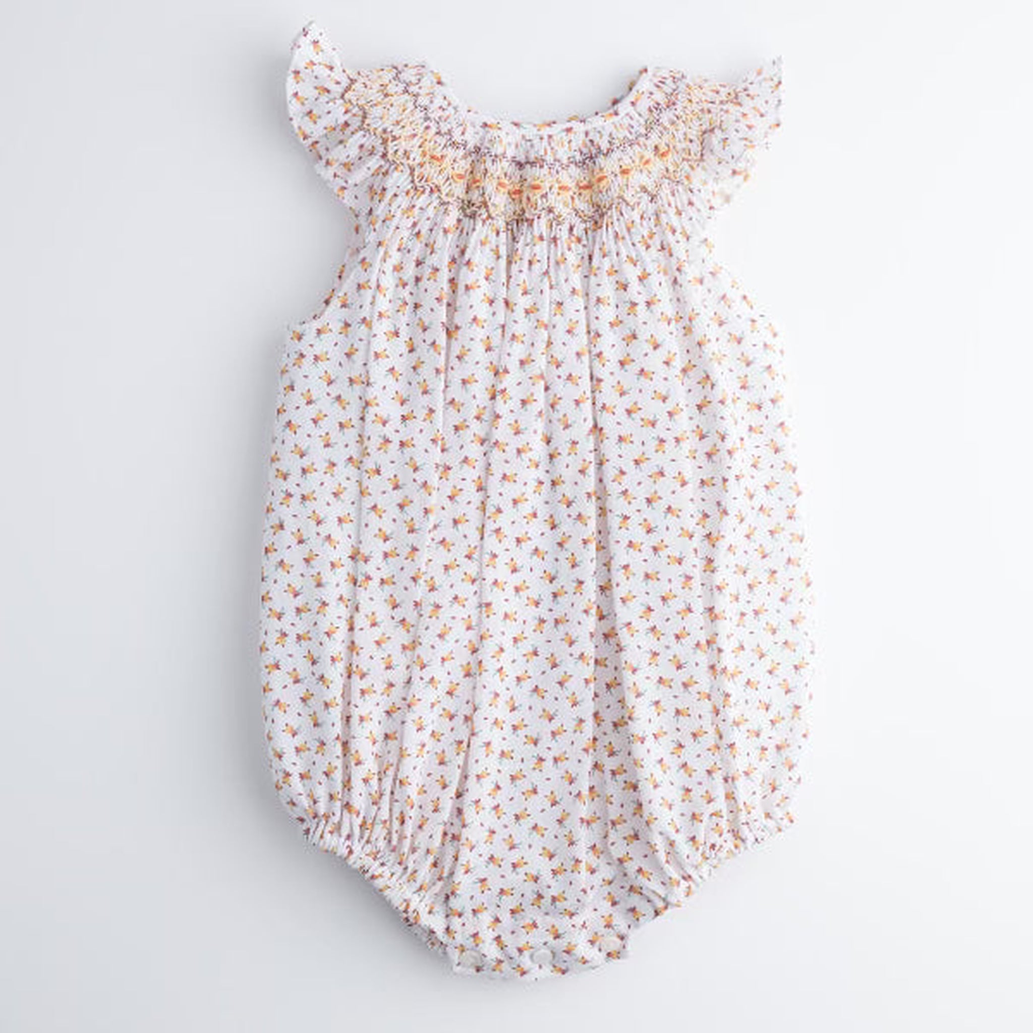 Hand Smocked Romper Flor Amarilla