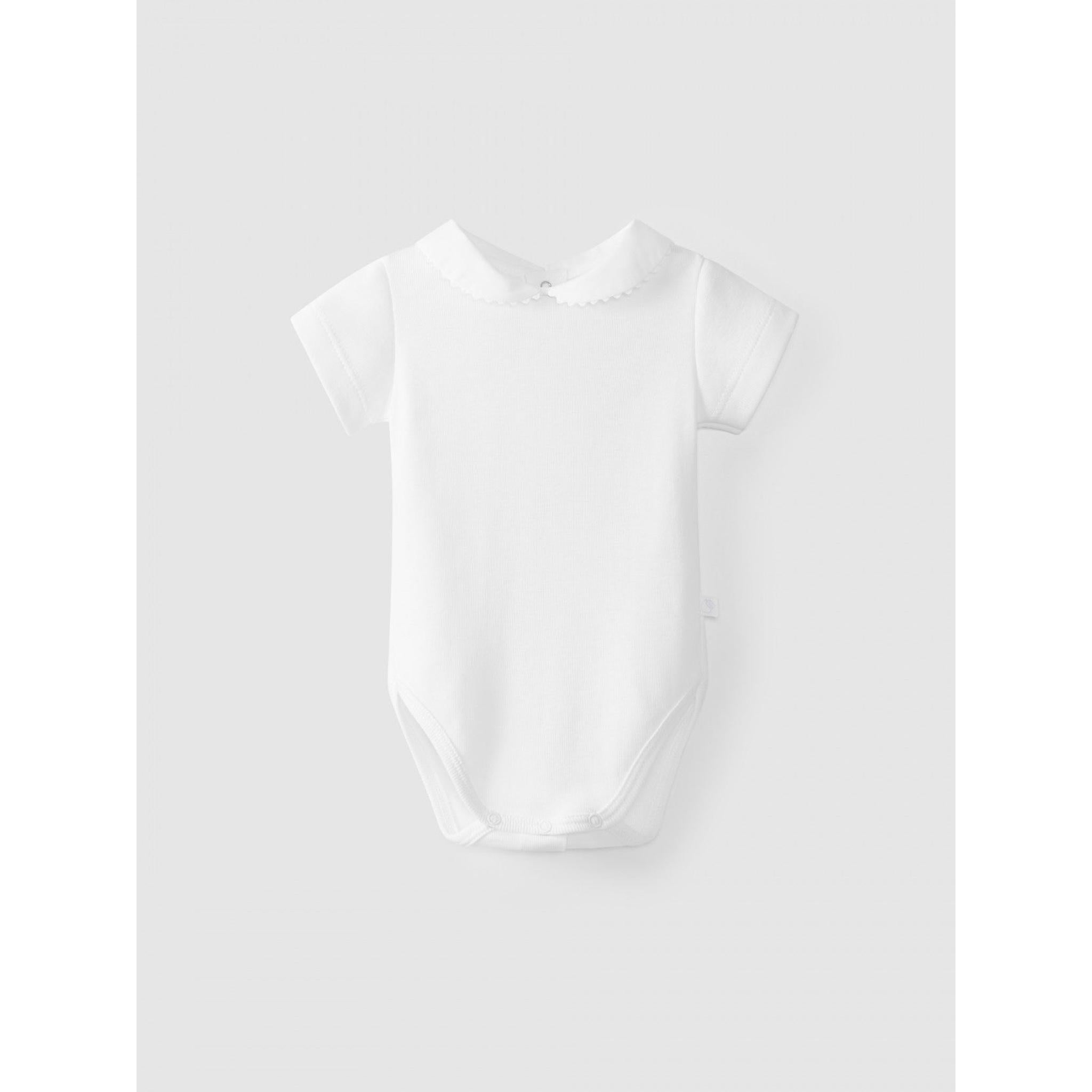 Short-sleeved bodysuit with Peter Pan collar