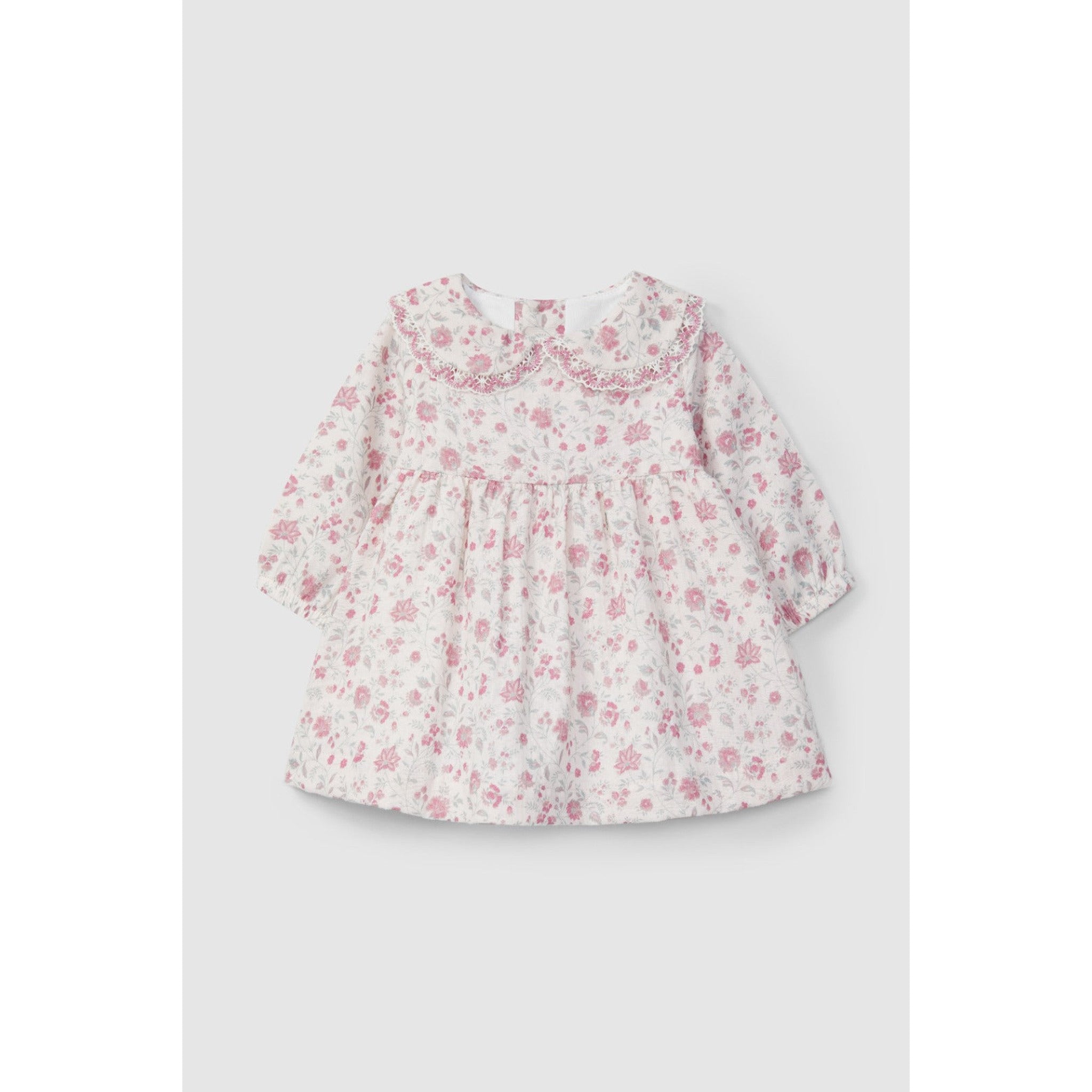 Dress in organic gauze with delicate lace detail